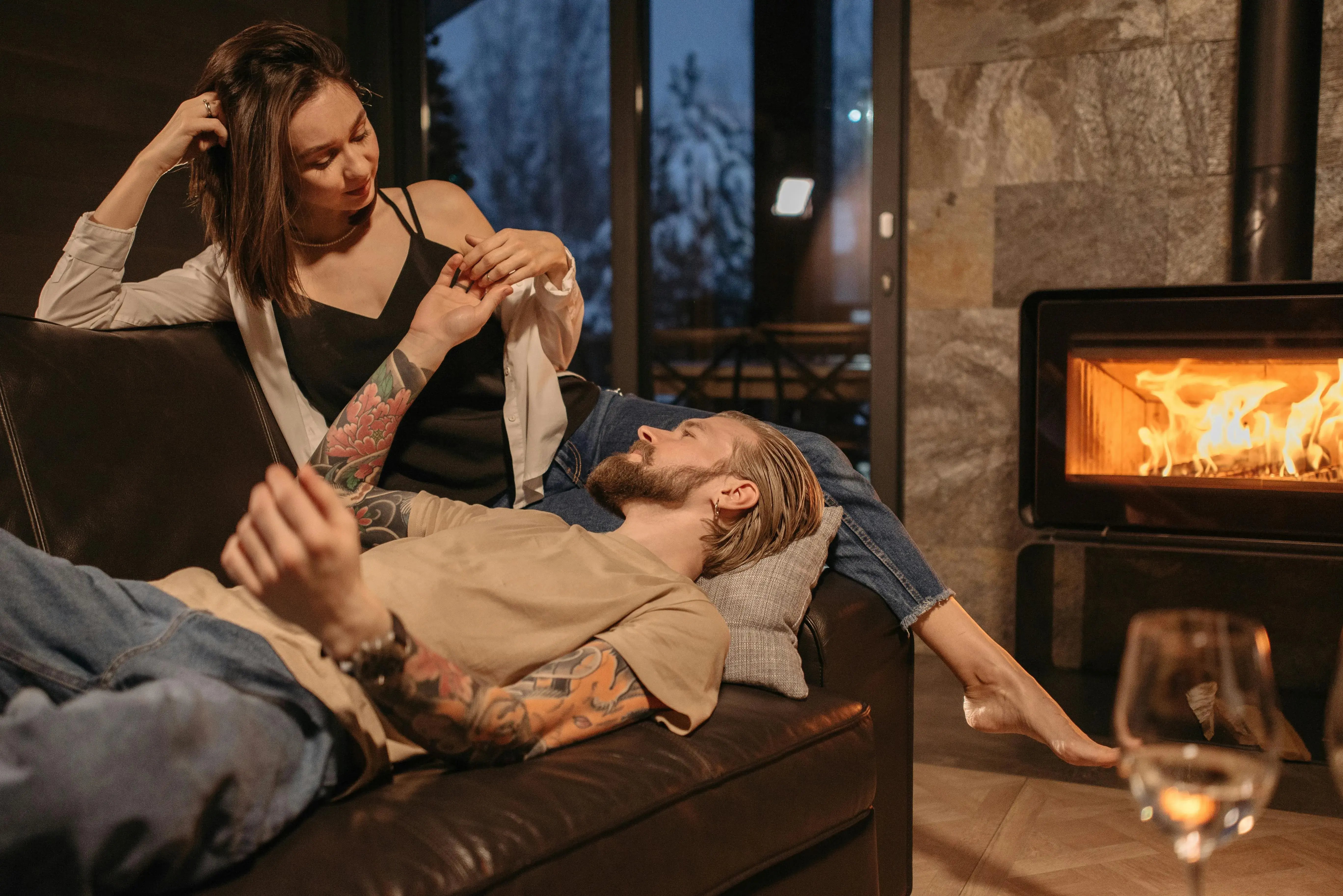 couple by fireplace