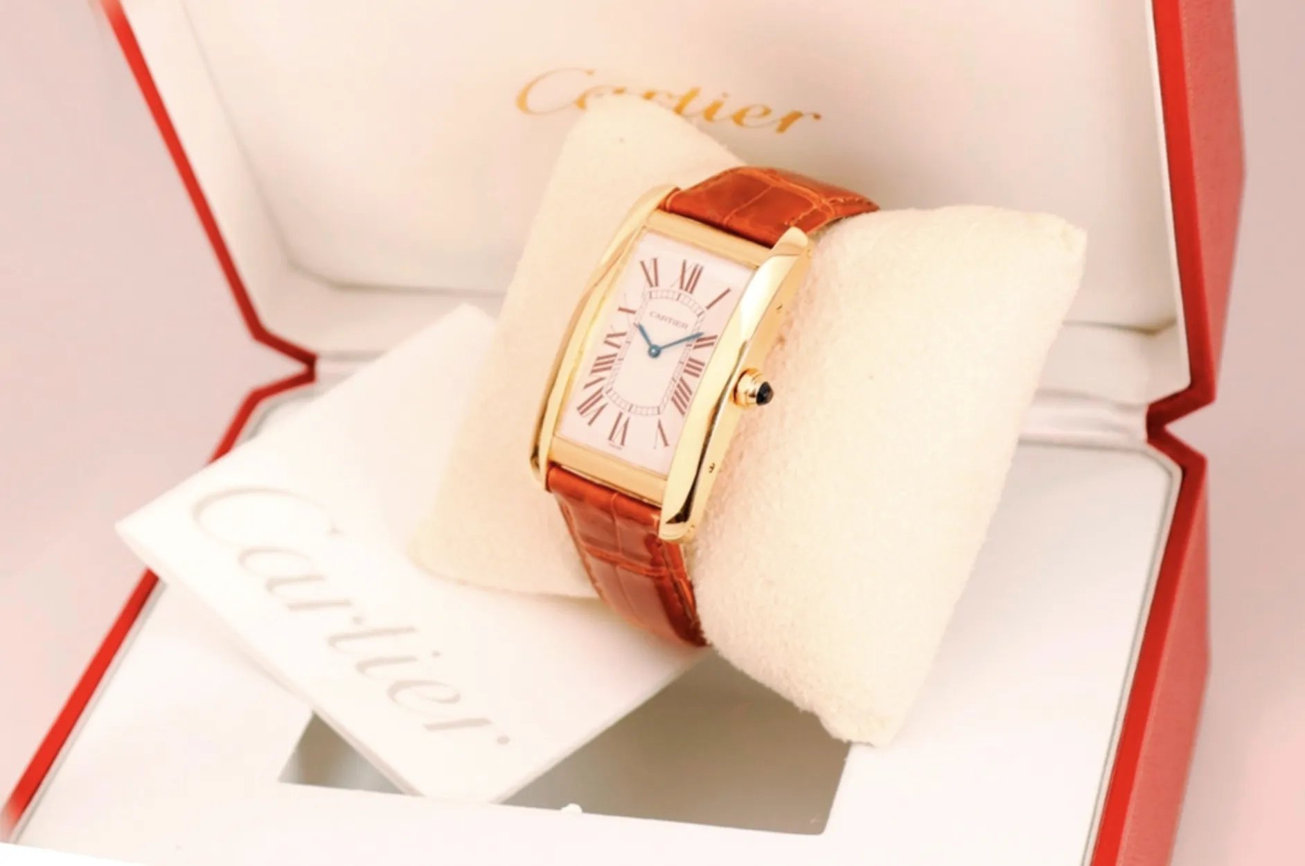 A vintage Cartier Tank in original box.
