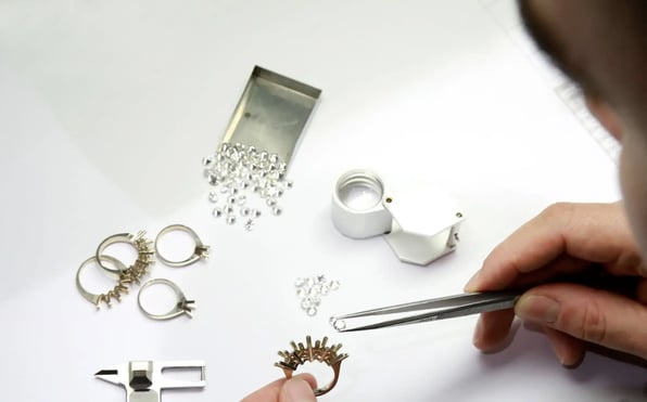  A jeweller working on an engagement ring 